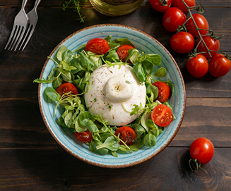 Photo du plat Mozzarella di bufala et ses tomates cerises